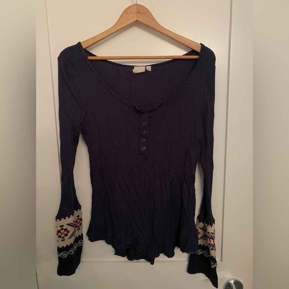Blue Henley with Knit Sleeves.